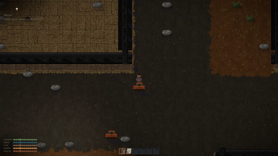 A lit interior room in the settlement of Millbrook, seen from above.